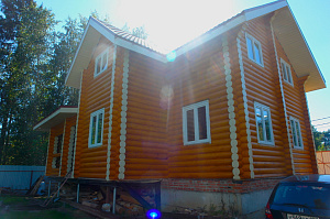 покраска домов из дерева