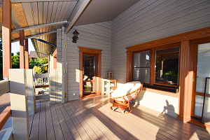 Финская надежность и русское брусовое зодчество: реставрация дома в Никольском краской Tikkurila Vinha