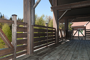 Фасад в стиле Шале: Изысканный коттедж в Новом Щеглово от Лесобиржи-Спб