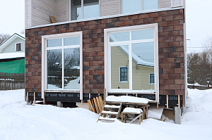 Современный каркасный дом с эксплуатируемой кровлей у Озера Врево