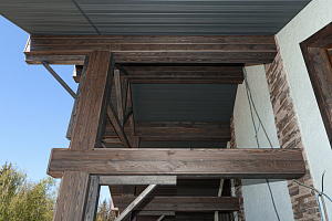 Фасад в стиле Шале: Изысканный коттедж в Новом Щеглово от Лесобиржи-Спб