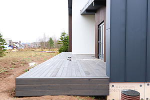 Премиальная отделка фасада и террасы лиственницей: проект ЛесоБиржи на Ладожские Берега