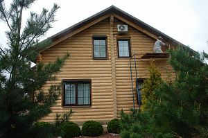 Поккраска деревянного дома