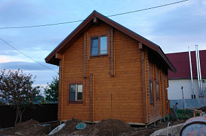 Покраска брусового дома