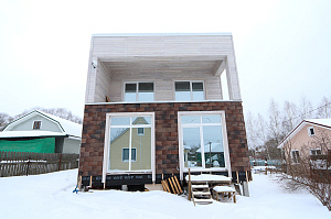 Современный каркасный дом с эксплуатируемой кровлей у Озера Врево