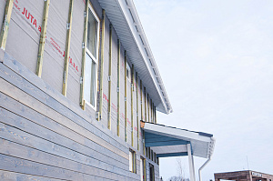 покраска дома маслом