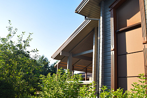 Финская надежность и русское брусовое зодчество: реставрация дома в Никольском краской Tikkurila Vinha