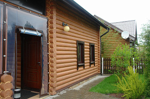 Покраска деревянного фасада