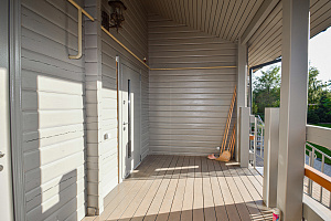 Финская надежность и русское брусовое зодчество: реставрация дома в Никольском краской Tikkurila Vinha