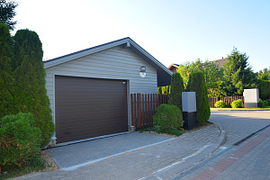 Финская надежность и русское брусовое зодчество: реставрация дома в Никольском краской Tikkurila Vinha