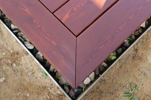 Гармония стиля и функциональности: гараж и терраса из лиственницы в Низово