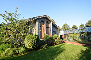 Финская надежность и русское брусовое зодчество: реставрация дома в Никольском краской Tikkurila Vinha