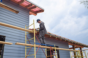 Дом обшитый сайдингом