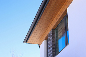 Современный комбинированный фасад: преображение коттеджа в КП 