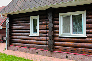 Покраска бревенчатого дома