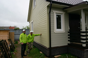 покраска деревянного дома цена