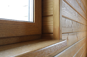 Шепот дерева: Завершенные работы по отделке стен и потолков в Кармолино