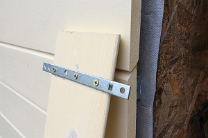 Фасад с характером: Сочетание лиственницы, сосны и камня в Honka Family Club