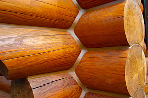 промазывание зазоров между бревен теплым швом